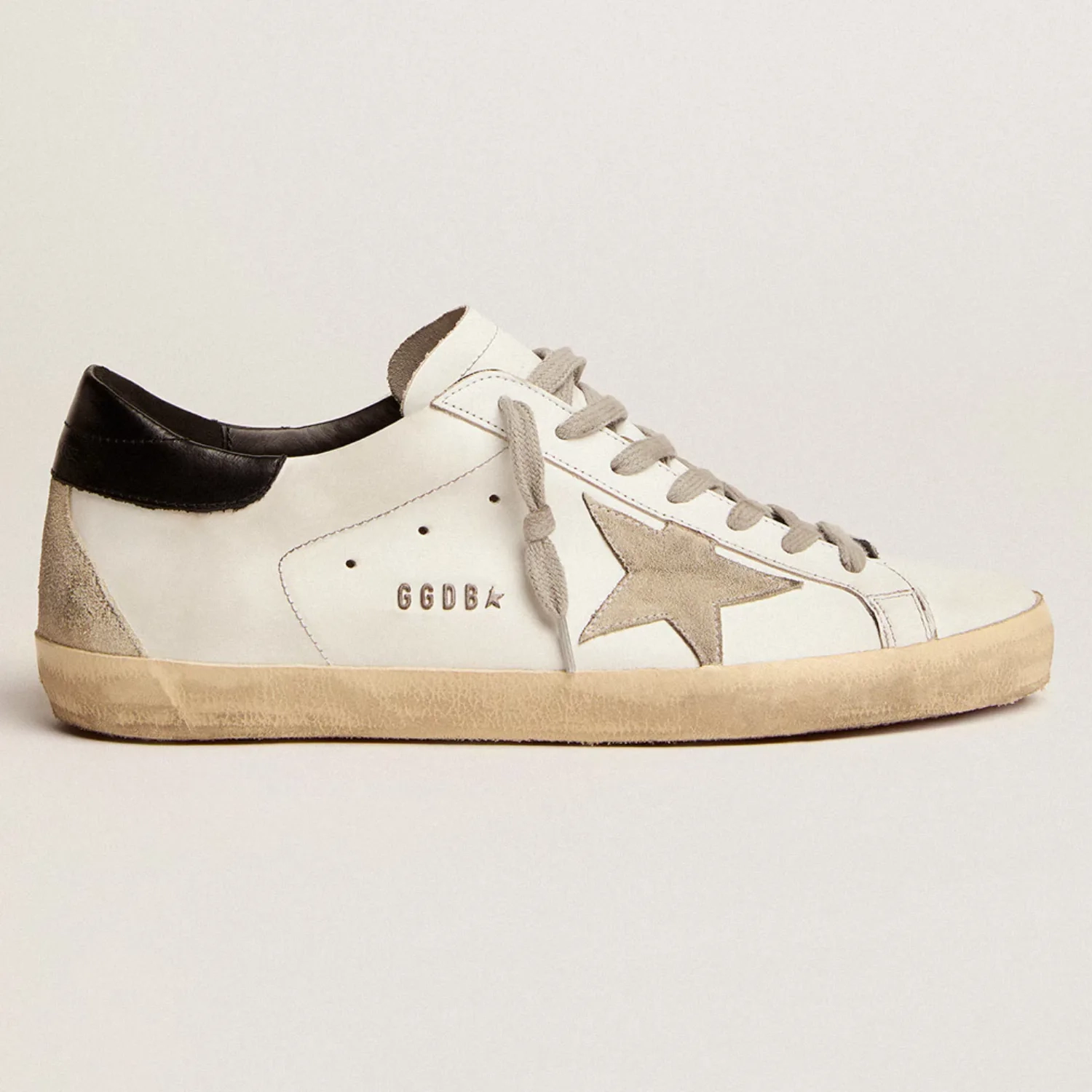 Mens Super Star with black heel tab and metal stud lettering